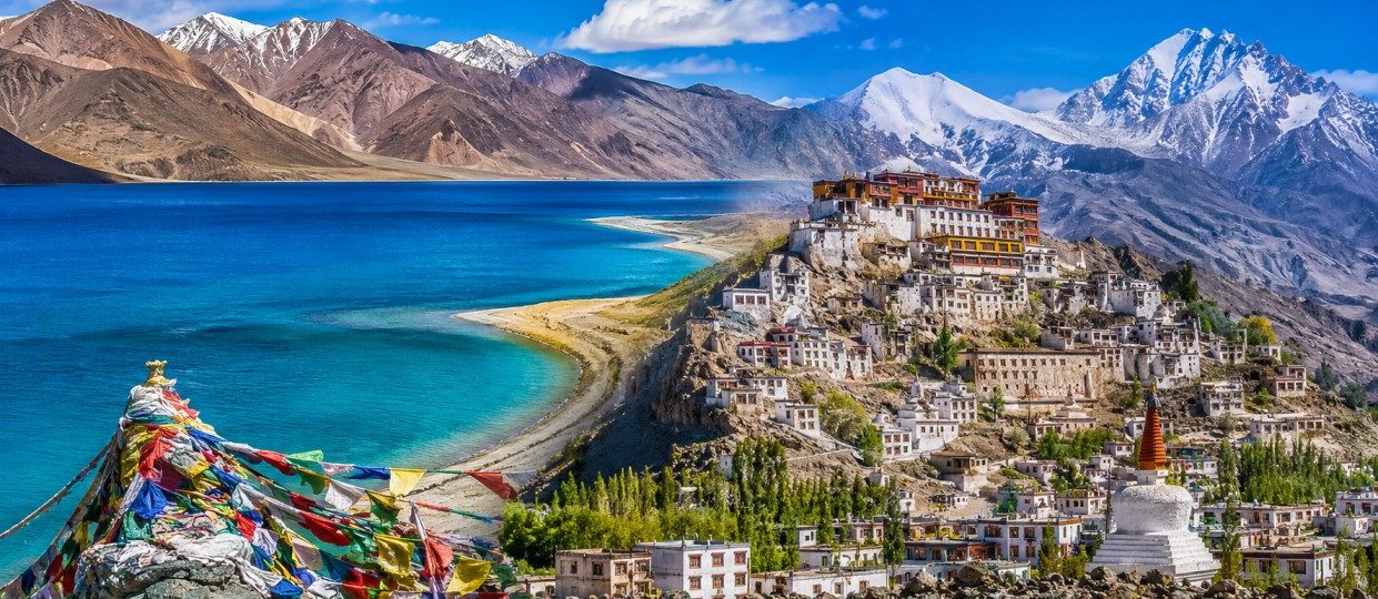 Best of Ladakh Package 2026 featuring Pangong Lake, Leh town, and Himalayan mountain landscapes