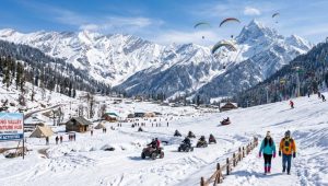 Delhi To Manali Tour Package 2026 with snow-covered mountains, Solang Valley adventure activities, and scenic Himalayan landscapes